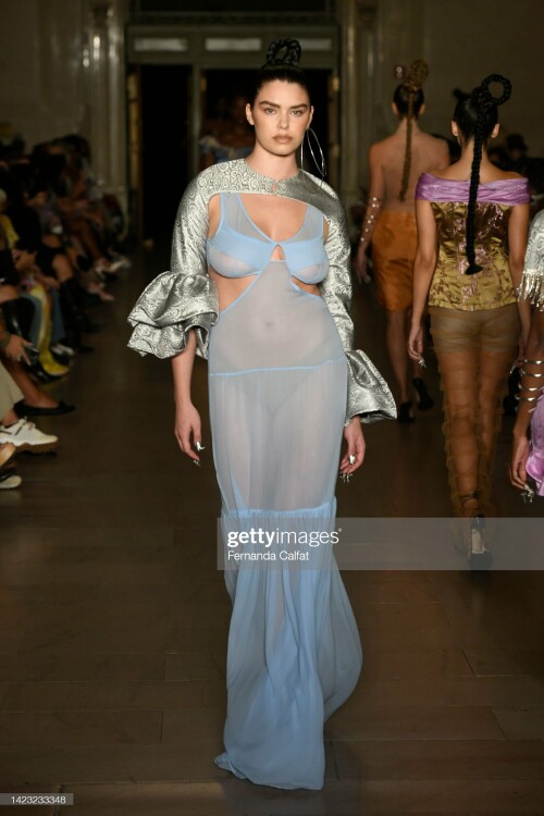 NEW YORK, NEW YORK - SEPTEMBER 12: (EDITORS NOTE: Image contains nudity.)  A model walks the runway for Kim Shui during New York Fashion Week : The Shows at Vanderbilt Hall at Grand Central Terminal on September 12, 2022 in New York City. (Photo by Fernanda Calfat/Getty Images for NYFW: The Shows)
