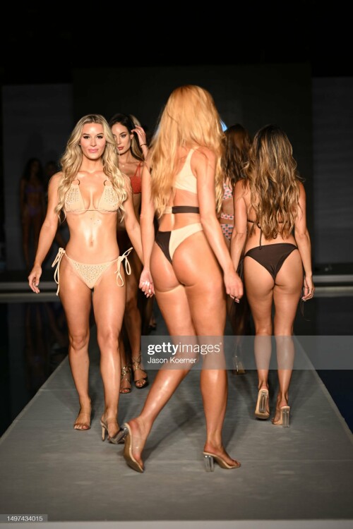 MIAMI BEACH, FLORIDA - JUNE 09: Models walk the runway for Origin Of Oceans Swimwear during Miami Swim Week by Planet Fashion With Paraiso Miami Beach at Hyde Beach at SLS South Beach on June 09, 2023 in Miami Beach, Florida. (Photo by Jason Koerner/Getty Images for Planet Fashion)