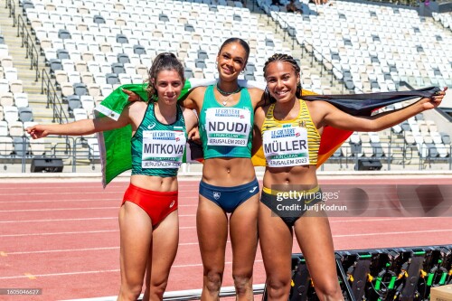 JERUSALEM, ISRAEL - AUGUST 10: (L-R) Silver medal winner Laura Raquel Muller of Germany, Gold medal winner Elizabeth Ndudi of Ireland and bronze medal winner Plamena Mitkova of Bulgaria pose with flags after Women's Long Jump during European Athletics U20 Championships Jerusalem - Day Four on August 10, 2023 in Jerusalem, Israel. (Photo by Jurij Kodrun/Getty Images for European Athletics)