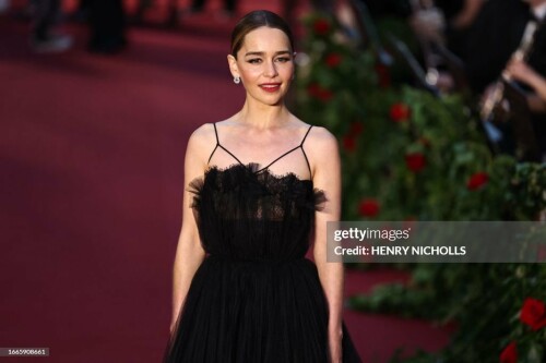 British actress Emilia Clarke poses upon arrival to attend the "Vogue World: London" event at the Theatre Royal Drury Lane in central London on the eve of London Fashion Week on September 14, 2023. (Photo by HENRY NICHOLLS / AFP) (Photo by HENRY NICHOLLS/AFP via Getty Images)