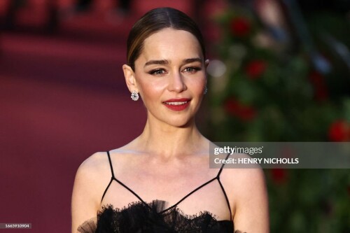 British actress Emilia Clarke poses upon arrival to attend the "Vogue World: London" event at the Theatre Royal Drury Lane in central London on the eve of London Fashion Week on September 14, 2023. (Photo by HENRY NICHOLLS / AFP) (Photo by HENRY NICHOLLS/AFP via Getty Images)