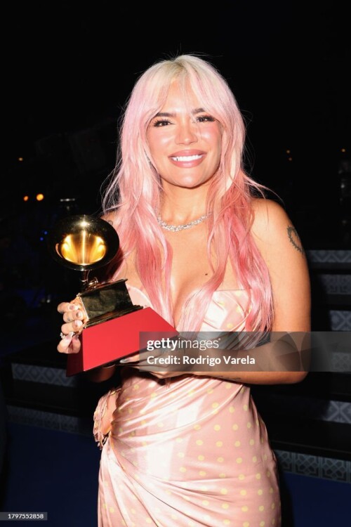 SEVILLE, SPAIN - NOVEMBER 16: Karol G poses with the Best Urban Music Album award at The 24th Annual Latin Grammy Awards on November 16, 2023 in Seville, Spain. (Photo by Rodrigo Varela/Getty Images for Latin Recording Academy)