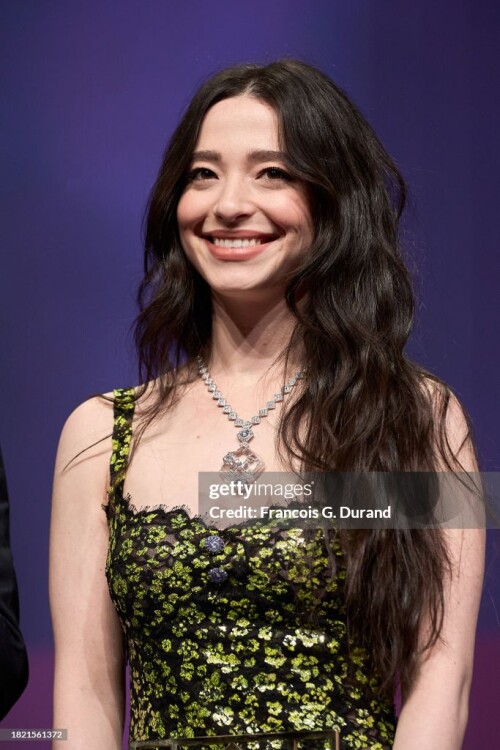 DEAUVILLE, FRANCE - SEPTEMBER 12: Mikey Madison receives the Hollywood Rising Star Award at the "Anora" premiere during the 50th Deauville American Film Festival on September 12, 2024 in Deauville, France. (Photo by Francois G. Durand/Getty Images)