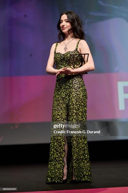 DEAUVILLE, FRANCE - SEPTEMBER 12: Mikey Madison receives the Hollywood Rising Star Award at the "Anora" premiere during the 50th Deauville American Film Festival on September 12, 2024 in Deauville, France. (Photo by Francois G. Durand/Getty Images)