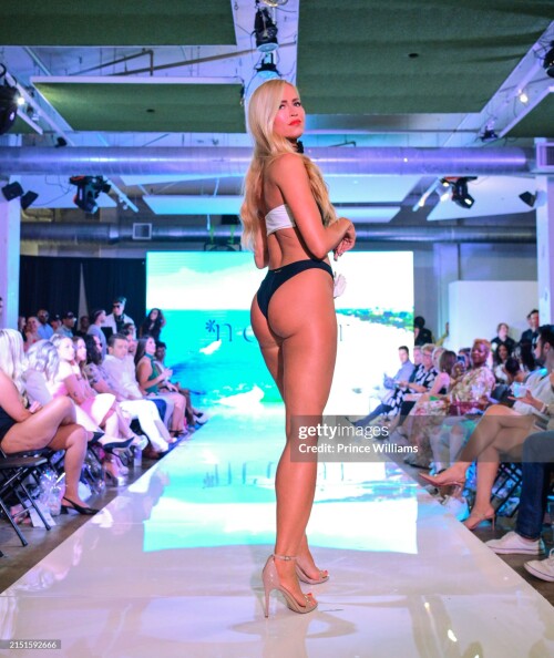 ATLANTA, GEORGIA - MAY 4: A model walks the runway during Atlanta Swim Week Show the at Westside Cultural Arts Center on May 4, 2024 in Atlanta, Georgia. (Photo by Prince Williams/WireImage)