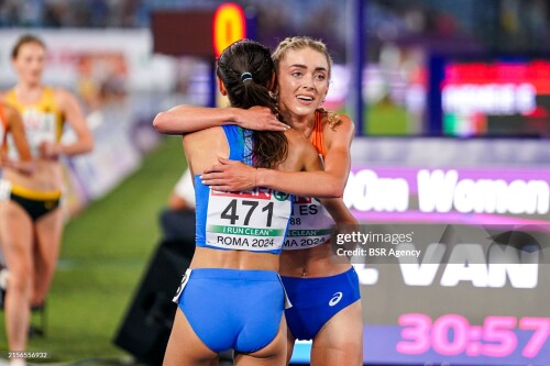 ROME, ITALY - JUNE 11: Diane Van Es of?the Netherlands winner of the second place hugging Nadia Battocletti of?Italy winner of the first place  after competing in the 10000m Women Final during Day Five of the European Athletics Championships - Rome 2024 at Stadio Olimpico on June 11, 2024 in Rome, Italy. (Photo by Joris Verwijst/BSR Agency/Getty Images)