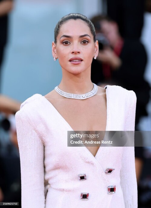 VENICE, ITALY - AUGUST 31: Adria Arjona attends the "Battlefield" (Campo Di Battaglia) red carpet during the 81st Venice International Film Festival on August 31, 2024 in Venice, Italy. (Photo by Andreas Rentz/Getty Images)
