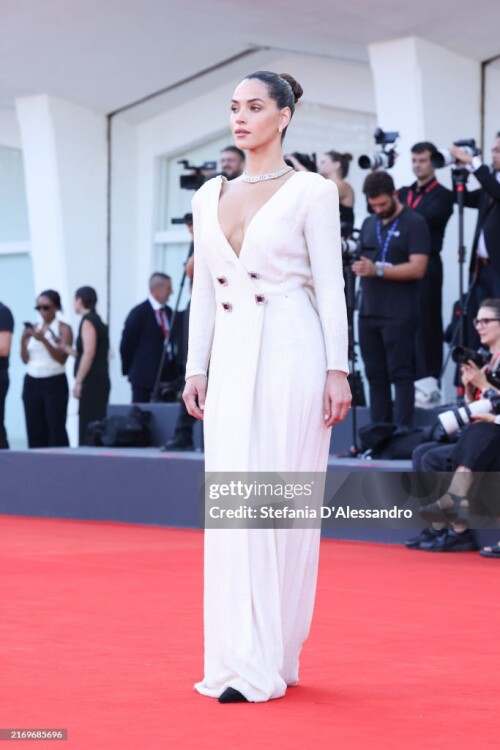 VENICE, ITALY - AUGUST 31: Adria Arjona attends the "Battlefield" (Campo Di Battaglia) red carpet during the 81st Venice International Film Festival on August 31, 2024 in Venice, Italy. (Photo by Stefania D'Alessandro/WireImage)