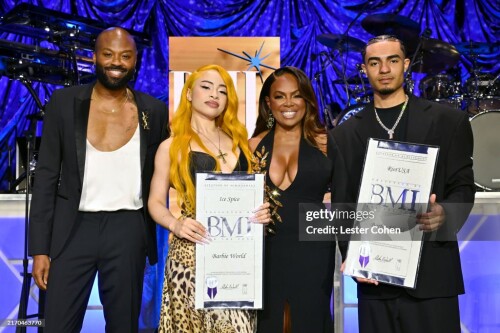 LOS ANGELES, CALIFORNIA - SEPTEMBER 05: (L-R) Wardell Malloy, Assistant VP, Creative, BMI Atlanta, Ice Spice, Catherine Brewton, VP of Creative, BMI Atlanta, and RIOTUSA pose with awards for "Barbie World" onstage during the 2024 BMI R&B/Hip-Hop Awards at Fairmont Century Plaza on September 05, 2024 in Los Angeles, California. (Photo by Lester Cohen/Getty Images for BMI)