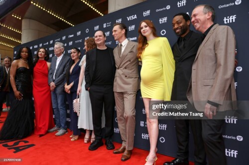 TORONTO, ONTARIO - SEPTEMBER 06: (L-R) Taylor Gordon,  AKA The Pocket Queen, Kate Siegel, Stephen King, Q'orianka Kilcher, Annalise Basso, Mike Flanagan, Tom Hiddleston, Karen Gillan, Chiwetel Ejiofor, and Trevor Macy attend the premiere of "The Life of Chuck" during the 2024 Toronto International Film Festival at Princess of Wales Theatre on September 06, 2024 in Toronto, Ontario. (Photo by Mathew Tsang/Getty Images)