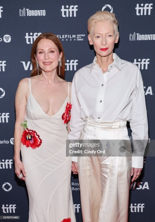 TORONTO, ONTARIO - SEPTEMBER 07: (L-R) Julianne Moore and Tilda Swinton attend the premiere of "The Room Next Door" during the 2024 Toronto International Film Festival at TIFF Lightbox on September 07, 2024 in Toronto, Ontario.  (Photo by Cindy Ord/Getty Images)