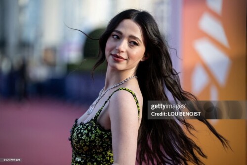 US actress Mikey Madison poses while arriving to attend the opening ceremony of the 50th edition of the Deauville American film festival, in Deauville, on September 12, 2024. (Photo by Lou BENOIST / AFP) (Photo by LOU BENOIST/AFP via Getty Images)