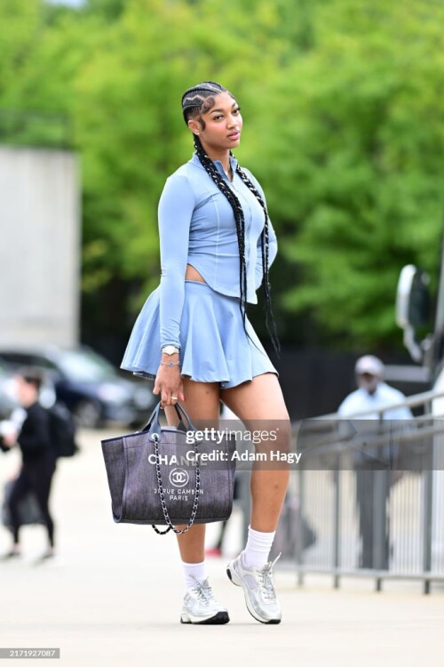 ATLANTA, GA - SEPTEMBER 17: Angel Reese #5 of the Chicago Sky arrives to the arena before the game against the Atlanta Dream on September 17, 2024 at Gateway Center Arena at College Park in Atlanta, Georgia. NOTE TO USER: User expressly acknowledges and agrees that, by downloading and or using this photograph, User is consenting to the terms and conditions of the Getty Images License Agreement. Mandatory Copyright Notice: Copyright 2024 NBAE (Photo by Adam Hagy/NBAE via Getty Images)