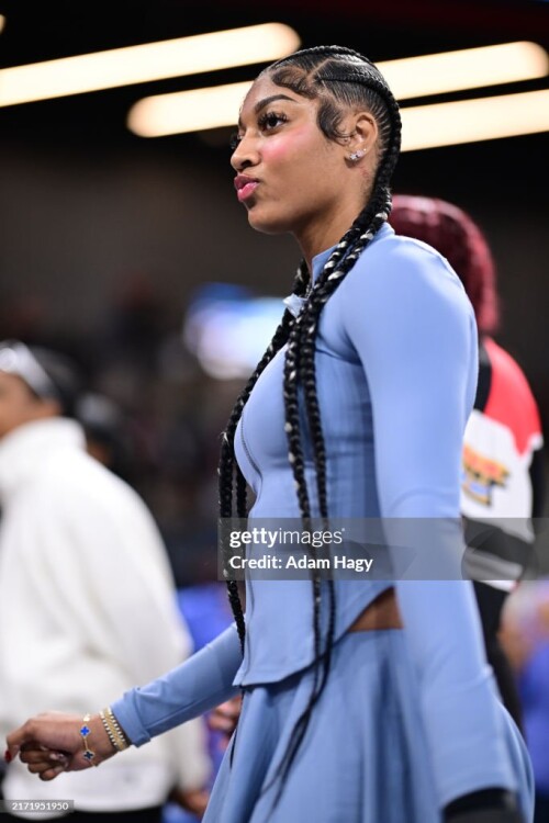 ATLANTA, GA - SEPTEMBER 17: Angel Reese #5 of the Chicago Sky smiles before the game against the Atlanta Dream on September 17, 2024 at Gateway Center Arena at College Park in Atlanta, Georgia. NOTE TO USER: User expressly acknowledges and agrees that, by downloading and or using this photograph, User is consenting to the terms and conditions of the Getty Images License Agreement. Mandatory Copyright Notice: Copyright 2024 NBAE (Photo by Adam Hagy/NBAE via Getty Images)