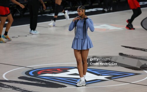 COLLEGE PARK, GEORGIA - SEPTEMBER 17:  Angel Reese #5 of the Chicago Sky looks on from midcourt during warmups prior to facing the Atlanta Dream at Gateway Center Arena on September 17, 2024 in College Park, Georgia.  NOTE TO USER: User expressly acknowledges and agrees that, by downloading and or using this photograph, User is consenting to the terms and conditions of the Getty Images License Agreement.  (Photo by Kevin C. Cox/Getty Images)