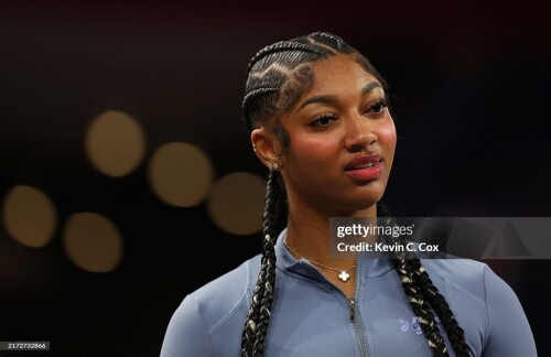 COLLEGE PARK, GEORGIA - SEPTEMBER 17:  Angel Reese #5 of the Chicago Sky reacts during player intros prior to facing the Atlanta Dream at Gateway Center Arena on September 17, 2024 in College Park, Georgia.  NOTE TO USER: User expressly acknowledges and agrees that, by downloading and or using this photograph, User is consenting to the terms and conditions of the Getty Images License Agreement.  (Photo by Kevin C. Cox/Getty Images)