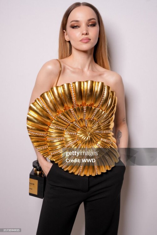 Dove Cameron at Balmain RTW Spring 2025 as part of Paris Ready to Wear Fashion Week held at Palais de Chaillot on September 25, 2024 in Paris, France.  (Photo by Swan Gallet/WWD via Getty Images)