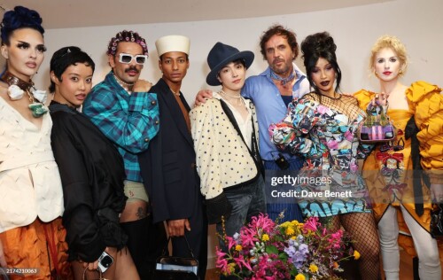 PARIS, FRANCE - SEPTEMBER 28: (L to R) Sita Abellan, Mia Kong, Lucky Love, MJ Harper, Hongjoong, Andreas Kronthaler, Cardi B and Haley Williams of Paramore pose backstage following the Andreas Kronthaler for Vivienne Westwood show during Paris Fashion Week Womenswear Spring-Summer 2025 on September 28, 2024 in Paris, France. (Photo by Hoda Davaine/Dave Benett/Getty Images)