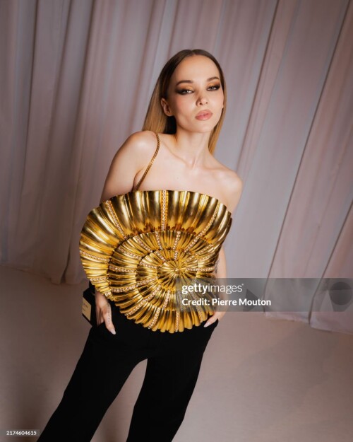 PARIS, FRANCE - SEPTEMBER 25: Dove Cameron attends the Balmain Womenswear Spring-Summer 2025 show as part of Paris Fashion Week on September 25, 2024 in Paris, France. (Photo by Pierre Mouton/Getty Images for Balmain)