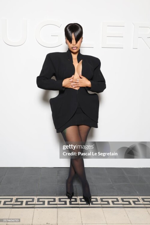 PARIS, FRANCE - SEPTEMBER 26: (EDITORIAL USE ONLY - For Non-Editorial use please seek approval from Fashion House) Cardi B attends the Mugler Womenswear Spring-Summer 2025 show as part of Paris Fashion Week on September 26, 2024 in Paris, France. (Photo by Pascal Le Segretain/Getty Images)