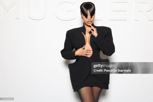 PARIS, FRANCE - SEPTEMBER 26: (EDITORIAL USE ONLY - For Non-Editorial use please seek approval from Fashion House) Cardi B attends the Mugler Womenswear Spring-Summer 2025 show as part of Paris Fashion Week on September 26, 2024 in Paris, France. (Photo by Pascal Le Segretain/Getty Images)