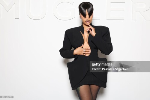 PARIS, FRANCE - SEPTEMBER 26: (EDITORIAL USE ONLY - For Non-Editorial use please seek approval from Fashion House) Cardi B attends the Mugler Womenswear Spring-Summer 2025 show as part of Paris Fashion Week on September 26, 2024 in Paris, France. (Photo by Pascal Le Segretain/Getty Images)