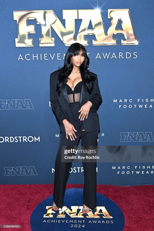 NEW YORK, NEW YORK - DECEMBER 04: Angel Reese attends Footwear News Achievement Awards (FNAAs) 2024 at Cipriani South Street on December 04, 2024 in New York City.  (Photo by Roy Rochlin/Footwear News via Getty Images)