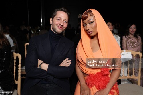 PARIS, FRANCE - JANUARY 27: Derek Blasberg and Megan Thee Stallion attend the Giambattista Valli Haute Couture Spring-Summer 2025 show as part of Paris Fashion Week on January 27, 2025 in Paris, France. (Photo by Pascal Le Segretain/Getty Images for Giambattista Valli)