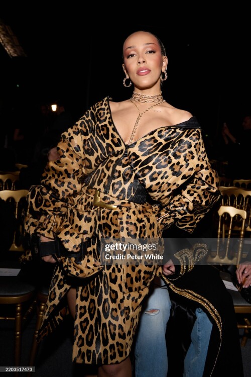 PARIS, FRANCE - MARCH 05: (EDITORIAL USE ONLY - For Non-Editorial use please seek approval from Fashion House) Doja Cat attends the Balmain Womenswear Fall/Winter 2025-2026 show as part of Paris Fashion Week  at Grande Halle de La Villette on March 05, 2025 in Paris, France. (Photo by Peter White/Getty Images)