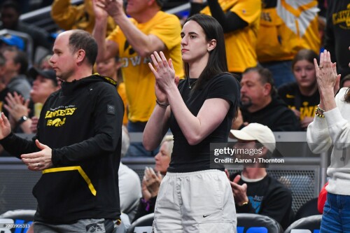 INDIANAPOLIS, INDIANA - MARCH 07: Current WNBA Player and Former Iowa Hawkeye Caitlin Clark reacts to a play during the second half of a Big Ten Women's Basketball Tournament Quarterfinals game between the Iowa Hawkeyes and the Ohio State Buckeyes at Gainbridge Fieldhouse on March 07, 2025 in Indianapolis, Indiana.  The Ohio State Buckeyes won the game 60-59. (Photo by Aaron J. Thornton/Getty Images)