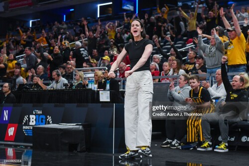 INDIANAPOLIS, INDIANA - MARCH 07: Current WNBA Player and Former Iowa Hawkeye Caitlin Clark reacts to a play during the second half of a Big Ten Women's Basketball Tournament Quarterfinals game between the Iowa Hawkeyes and the Ohio State Buckeyes at Gainbridge Fieldhouse on March 07, 2025 in Indianapolis, Indiana.  The Ohio State Buckeyes won the game 60-59. (Photo by Aaron J. Thornton/Getty Images)