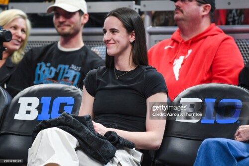 INDIANAPOLIS, INDIANA - MARCH 07: Current WNBA Player and former Iowa Hawkeye Caitlin Clark attends a Big Ten Women's Basketball Tournament - Quarterfinals game between the Iowa Hawkeyes and the Ohio State Buckeyes at Gainbridge Fieldhouse on March 07, 2025 in Indianapolis, Indiana.  The Ohio State Buckeyes won the game 60-59. (Photo by Aaron J. Thornton/Getty Images)