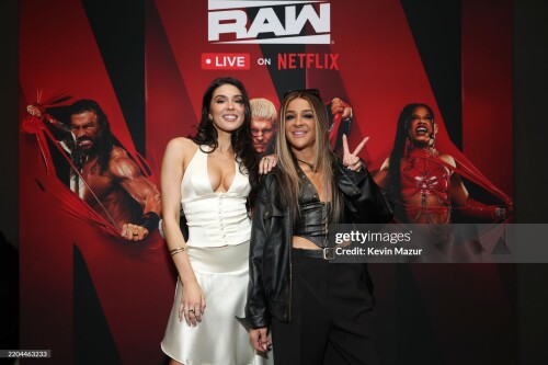 NEW YORK, NEW YORK - MARCH 10: (L-R) Cathy Kelley and Dakota Kai attend the WWE RAW LIVE ON NETFLIX at Madison Square Garden on March 10, 2025 in New York City. (Photo by Kevin Mazur/Kevin Mazur/ Getty Images For Netflix)