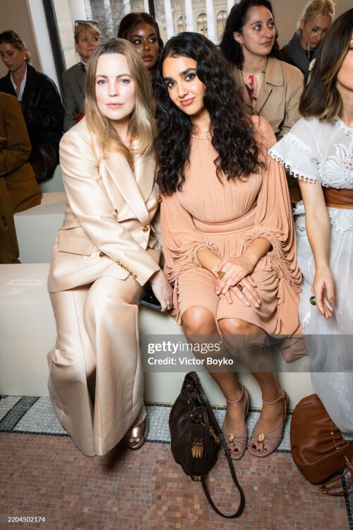 PARIS, FRANCE - MARCH 10: (EDITORIAL USE ONLY - For Non-Editorial use please seek approval from Fashion House) Melissa George and Geraldine Viswanathan attend the Zimmermann Womenswear Fall/Winter 2025-2026 show as part of Paris Fashion Week  at Le Petit Palais on March 10, 2025 in Paris, France. (Photo by Victor Boyko/Getty Images)
