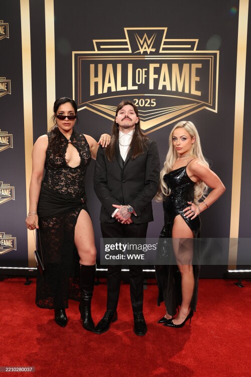 LAS VEGAS, NEVADA - APRIL 18: Raquel Rodriguez, Dominik Mysterio and Liv Morgan on the Red Carpet of the 2025 Hall of Fame at BleauLive Theater at Fontainebleau Las Vegas on April 18, 2025 in Las Vegas, Nevada.  (Photo by Andrea Kellaway/WWE via Getty Images)