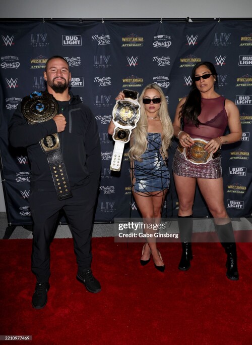 LAS VEGAS, NEVADA - APRIL 19: (L-R) WWE Intercontinental Champion Bron Breakker, WWE Women's Tag Team Champions Liv Morgan and Raquel Rodriguez attend WrestleMania After Dark Las Vegas Hall Of Fame event featuring Metro Boomin at LIV Nightclub at Fontainebleau Las Vegas on April 19, 2025 in Las Vegas, Nevada. (Photo by Gabe Ginsberg/Getty Images)