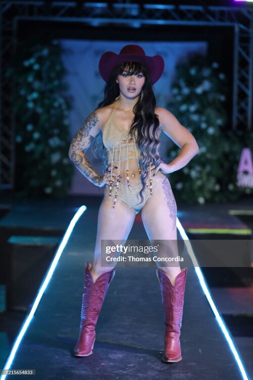 ATLANTA, GEORGIA - MAY 17: A model walks the runway wearing Coastal Smokeshow during the ATLSW Runway Show "Tulum After Dark" at Westside Cultural Arts Center on May 17, 2025 in Atlanta, Georgia. (Photo by Thomas Concordia/Getty Images for Atlanta Swim Week)