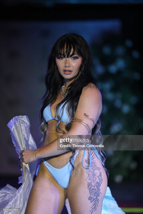 ATLANTA, GEORGIA - MAY 17: A model walks the runway wearing Madeleine Gray Designs during the ATLSW Runway Show "Tulum After Dark" at Westside Cultural Arts Center on May 17, 2025 in Atlanta, Georgia. (Photo by Thomas Concordia/Getty Images for Atlanta Swim Week)