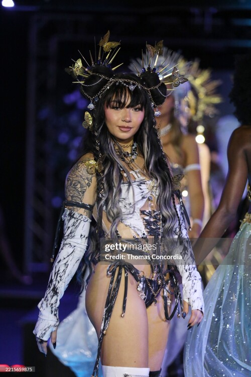 ATLANTA, GEORGIA - MAY 17: A model walks the runway wearing Whimsy Forge during the ATLSW Runway Show "Tulum After Dark" at Westside Cultural Arts Center on May 17, 2025 in Atlanta, Georgia. (Photo by Thomas Concordia/Getty Images for Atlanta Swim Week)