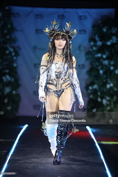 ATLANTA, GEORGIA - MAY 17: A model walks the runway wearing Whimsy Forge during the ATLSW Runway Show "Tulum After Dark" at Westside Cultural Arts Center on May 17, 2025 in Atlanta, Georgia. (Photo by Thomas Concordia/Getty Images for Atlanta Swim Week)