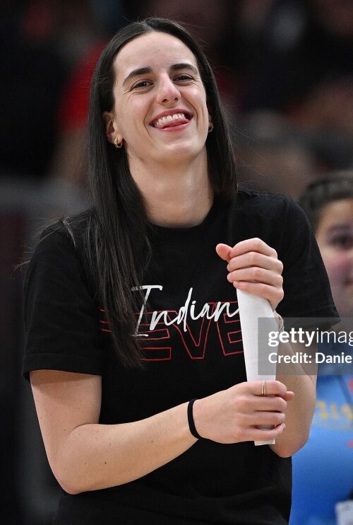 CHICAGO, ILLINOIS - JUNE 07: Caitlin Clark #22 of the Indiana Fever looks on during a break in play against the Chicago Sky at the United Center on June 07, 2025 in Chicago, Illinois. NOTE TO USER: User expressly acknowledges and agrees that, by downloading and or using this photograph, user is consenting to the terms and conditions of the Getty Images License Agreement. (Photo by Daniel Bartel/Getty Images)