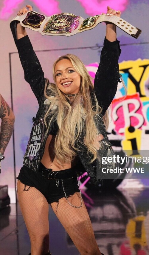 GREEN BAY, WISCONSIN - JUNE 16: WWE Women's Tag Team Champion Liv Morgan makes her entrance with Intercontinental Champion Dominik Mysterio during Monday Night RAW at Resch Center on June 16, 2025 in Green Bay, Wisconsin.  (Photo by Craig Melvin/WWE via Getty Images)