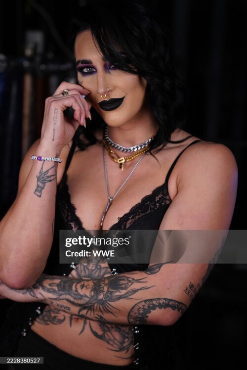 ST PAUL, MINNESOTA- JULY 29: Rhea Ripley poses for portraits backstage during Monday Night RAW on July 29, 2024 at the Xcel Energy Center in Saint Paul, Minnesota. (Photo by WWE via Getty Images)