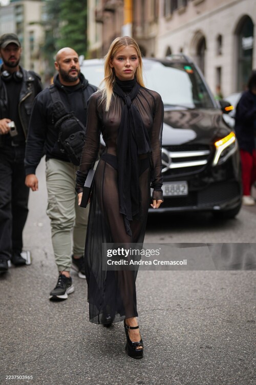 MILAN, ITALY - SEPTEMBER 26: (EDITORS NOTE: Image contains partial nudity.) Alla Bruletova arrives at Blumarine fashion show during the Milan Womenswear Spring/Summer 2026 Fashion Week on September 26, 2025 in Milan, Italy. (Photo by Andrea Cremascoli/GC Images)