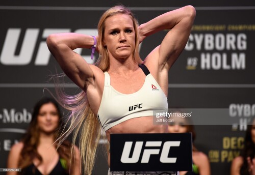 LAS VEGAS, NV - DECEMBER 29:  Holly Holm poses on the scale during the UFC 219 weigh-in inside T-Mobile Arena on December 29, 2017 in Las Vegas, Nevada. (Photo by Jeff Bottari/Zuffa LLC/Zuffa LLC via Getty Images)