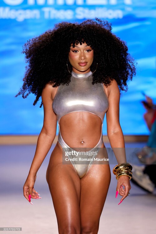 MIAMI BEACH, FLORIDA - MAY 29: Megan Thee Stallion walks the runway for Hot Girl Summer Swimwear By Megan Thee Stallion during Paraiso Miami Swim Week 2025 at The Paraiso Tent on May 29, 2025 in Miami Beach, Florida.  (Photo by Romain Maurice/Getty Images)