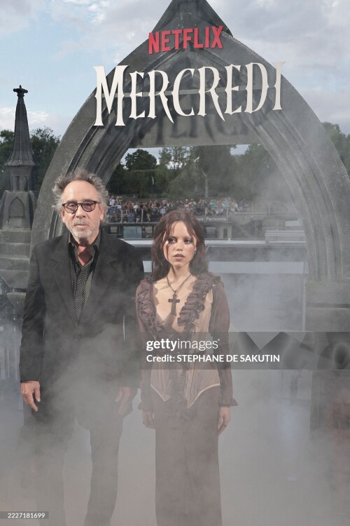 US director Tim Burton (L) and US actress Jenna Ortega pose during the premier of the second Season of the supernatural mystery Netflix TV series "Wednesday" in Paris on July 31, 2025. (Photo by STEPHANE DE SAKUTIN / AFP) (Photo by STEPHANE DE SAKUTIN/AFP via Getty Images)