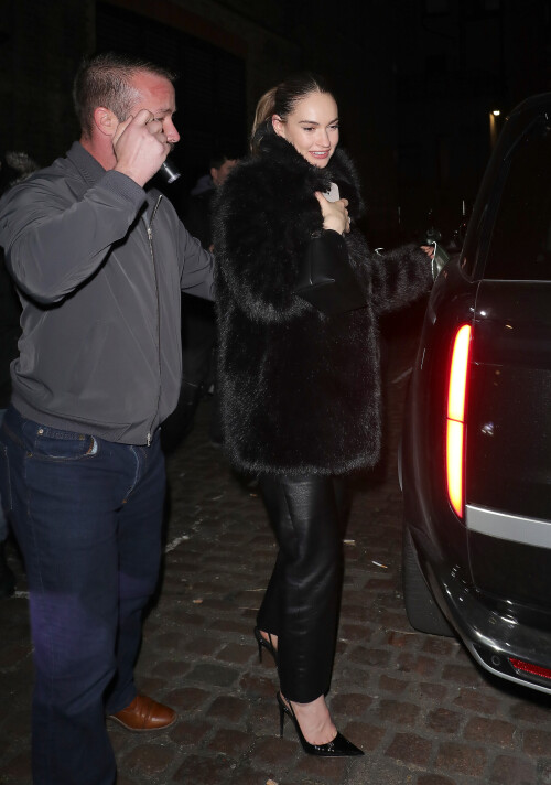 20 December 2024 - EXCLUSIVE.Actress Lily James appears worse for wear as she is seen leaving the Chiltern Firehouse London at 4am with Airbnb Co Founder and CEO Brian Chesky. Brian is the 355th richest person in the world according to Forbes, with a net worth of $7.8 billion. The pair attempted to sneak out the back of the Chiltern Firehouse with Chesky attempting to cover his face as they entered a waiting Range Rover. Credit: GoffPhotos.com   Ref: KGC-29/49/305/453**Exclusive to GoffPhotos.com - Newspapers To Agree - Magazines Double Space Rates Minimum Fee of 350 - ONLINE/WEB MUST CALL BEFORE USE - ONLINE EMBARGOED UNTIL 23:00 22/12/24**