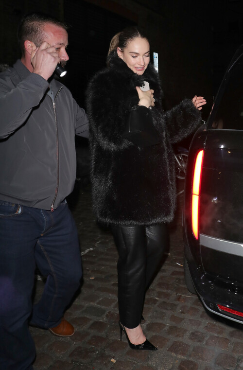 20 December 2024 - EXCLUSIVE.Actress Lily James appears worse for wear as she is seen leaving the Chiltern Firehouse London at 4am with Airbnb Co Founder and CEO Brian Chesky. Brian is the 355th richest person in the world according to Forbes, with a net worth of $7.8 billion. The pair attempted to sneak out the back of the Chiltern Firehouse with Chesky attempting to cover his face as they entered a waiting Range Rover. Credit: GoffPhotos.com   Ref: KGC-29/49/305/453**Exclusive to GoffPhotos.com - Newspapers To Agree - Magazines Double Space Rates Minimum Fee of 350 - ONLINE/WEB MUST CALL BEFORE USE - ONLINE EMBARGOED UNTIL 23:00 22/12/24**