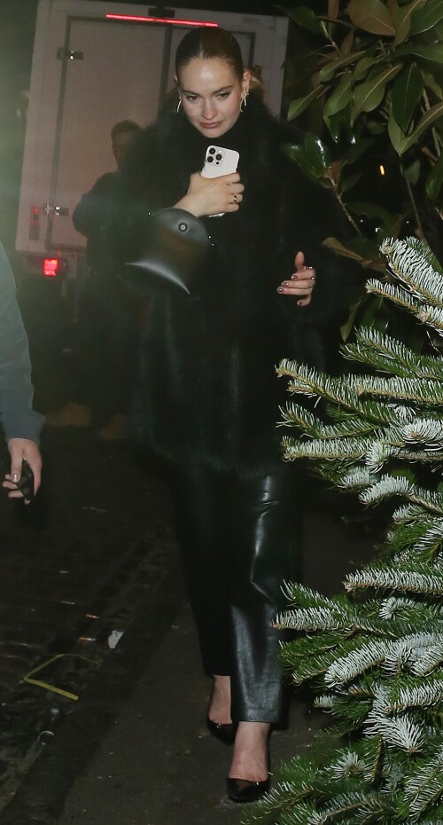 20 December 2024 - EXCLUSIVE.Actress Lily James appears worse for wear as she is seen leaving the Chiltern Firehouse London at 4am with Airbnb Co Founder and CEO Brian Chesky. Brian is the 355th richest person in the world according to Forbes, with a net worth of $7.8 billion. The pair attempted to sneak out the back of the Chiltern Firehouse with Chesky attempting to cover his face as they entered a waiting Range Rover. Credit: GoffPhotos.com   Ref: KGC-29/49/305/453**Exclusive to GoffPhotos.com - Newspapers To Agree - Magazines Double Space Rates Minimum Fee of 350 - ONLINE/WEB MUST CALL BEFORE USE - ONLINE EMBARGOED UNTIL 23:00 22/12/24**